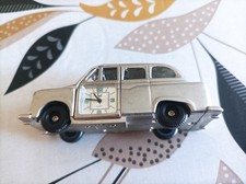 pendule à pile représentant un taxi anglais-voir description