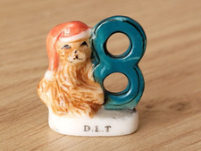 Fève - 8 et petit ours  ---   (Ref. 7201)