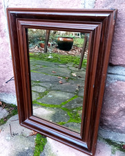 Miroir mouluré laqué marron