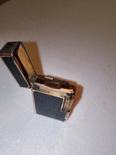 Briquet Dupont laqué noir sans gaz dans son jus