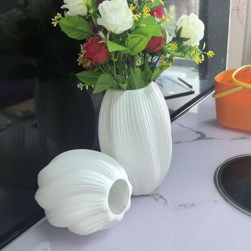 Vase fleurs centre - à,