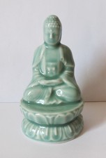 Petite statue dieu bouddha  en