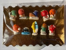 Série complète de 10 fèves neuves OASIS SPORTS  de 2018