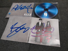 U2 autographs group cd album