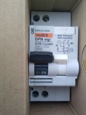 1 disjoncteur différentiel  DPN 2 poles 10 Amp 30ma type AC MERLIN GERIN