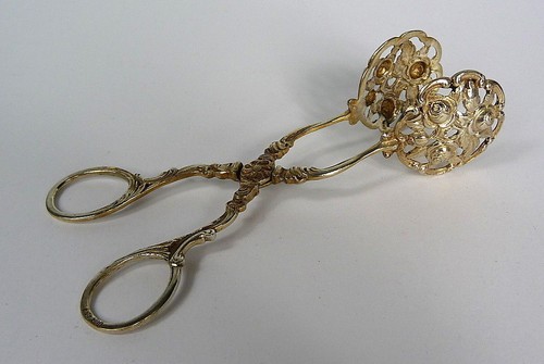 Pince gâteaux rose - À,