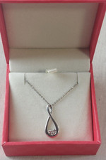 Très beau collier + pendentif, en argent massif et zircon, infini, Didier Guérin