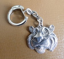 Ancien porte clé Esso Tête du Tigre métal argenté, garage station automobile..