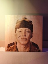Tableau fait à la pyrogravure