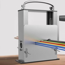 Machine à dénuder manuelle