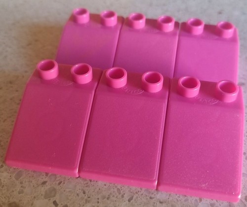 Unique plus used pink tiles - used,