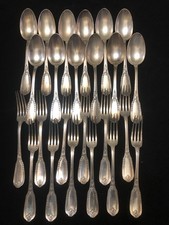 12 COUVERTS FOURCHETTES ET CUILLERES RAVINET POINCON R C ET UN TREFLE EMPIRE