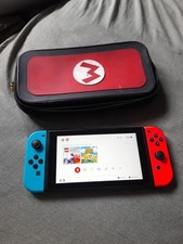 Nintendo Switch 32 Go Console avec Paire de Joy-Con - Bleu/Rouge + Sacoche Mario