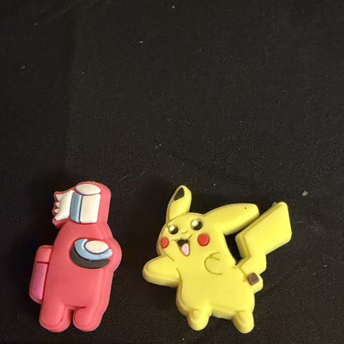 Pikachu among shoe charms - &,