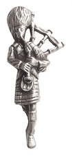 Broche en étain joueur de