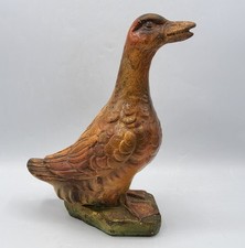 Tirelire à casser formant canard en plâtre polychrome début XXème