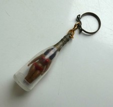 Ancien porte clé mini poupée