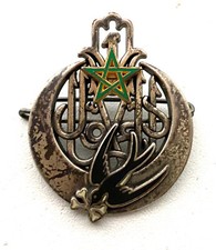 MEDAILLE BROCHE INSIGNE PUCELLE MILITAIRE  1ER REGIMENT DE TIRAILLEUR