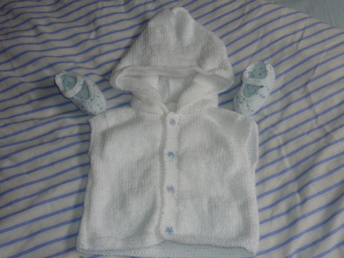 Gilet capuche sans - à,