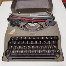 Machine à écrire ancienne Hermes Baby Suisse