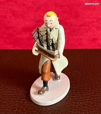 FIGURINE MOULINSART  2011 - TINTIN AVEC MAQUETTE DE  LA LICORNE /Neuf