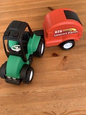 Tracteur et sa remorque pour ballots de paille