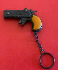 Porte clefs pistolet amorce - porte,