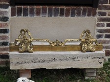 Barre de cheminée XIX EME en bronze.long 90 cm.long déployée 116 cm. Haut 21 cm.