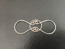 Vieux casse-tête chinois en fer.