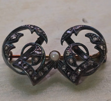 ANCIENNE BROCHE AVEC ECLATS DE