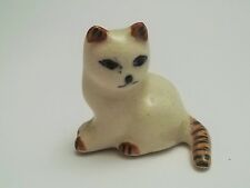 chat miniature en