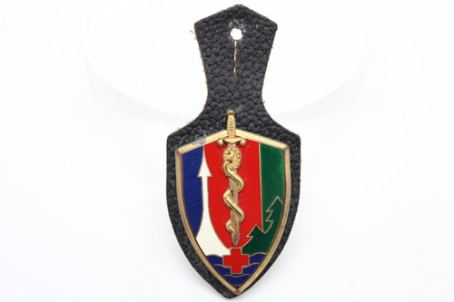 Insigne direction du - de, la