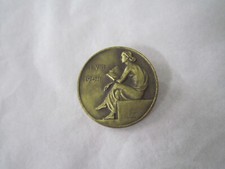 BROCHE  BRONZE  A IDENTIFIER 1954 SIGNEE HUGUENIN LOCLE