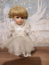 ancienne poupée avec support