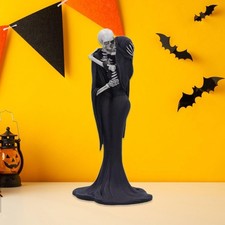 Statue de couple squelette en