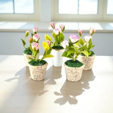 Miniature petite fleur rose en