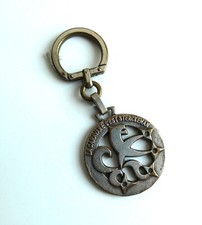 Ancien porte cle métal Augis