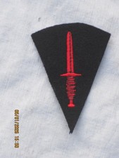Insigne Commando, Écusson