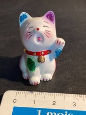 MANEKI NEKO chat japonnais saluant