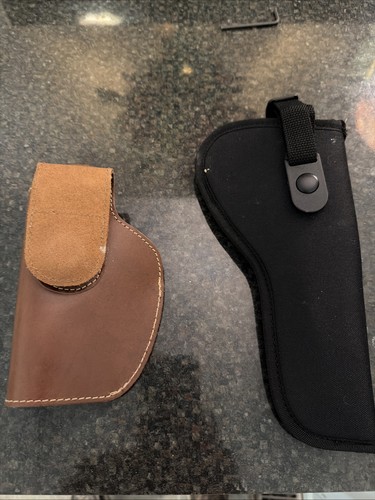 Two new holsters - new,