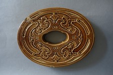 Bettstein en terre cuite  art