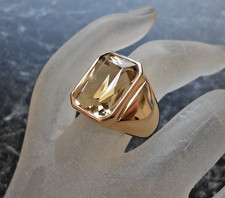 Bague or 18K sertie d une citrine de 12 carats  poincon tete d aigle  T 51