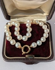 Bracelet perles de culture 6 mm grand fermoir anneau marin or massif  18 carats