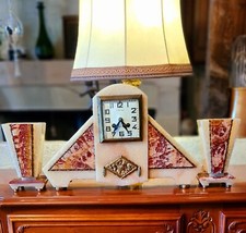 Pendule Art Déco en marbre veiné et albâtre jaspé. Pas d'envoi.