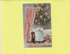 CPA PRIERE DE LA FILLETTE AVEC SON CHIEN ET POUPEE DEVANT UN SAPIN LUMINEUX