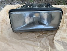 LEFT HEADLIGHT JAGUAR XJ40