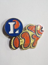 Pin's Poisson Exotique, Enseigne Magasin Leclerc