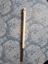 Porte plume, 19e siècle , sculpté en son bout d'une tête , embout en argent.