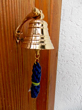 Petite cloche murale en laiton