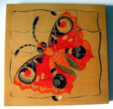 Puzzle Bois - De la Chenille au Papillon - 4 niveaux - 38 pièces - 18½*18½ cm 